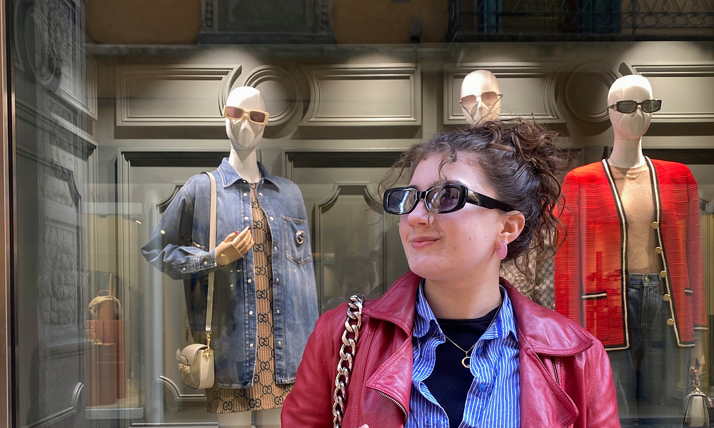 Student Adriana Cocerhan in front of store