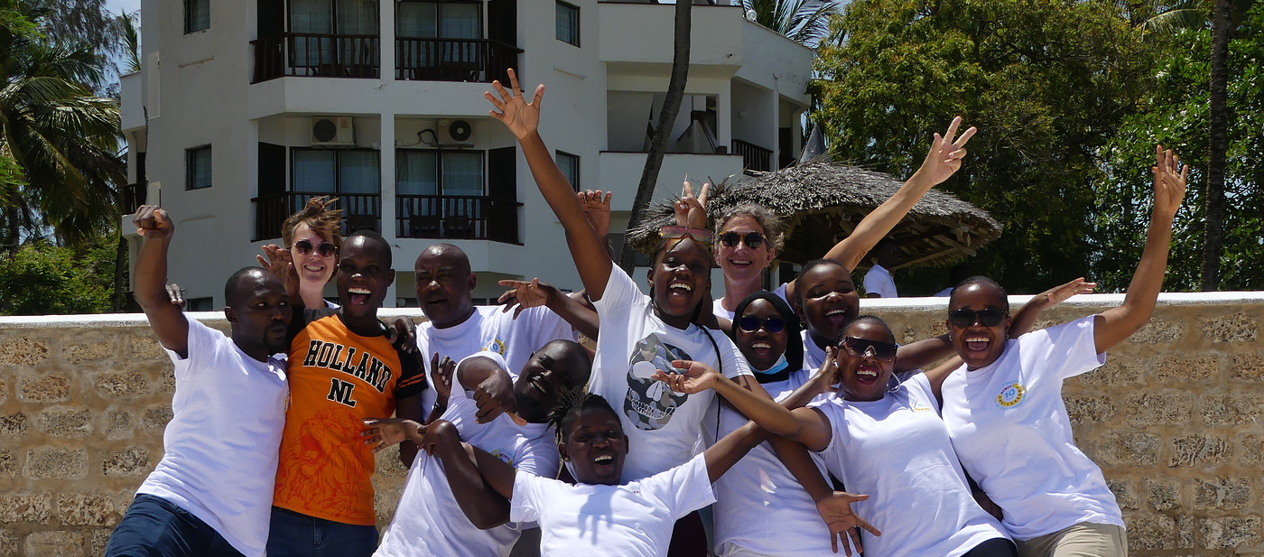 Group of Kenyan people in front of building