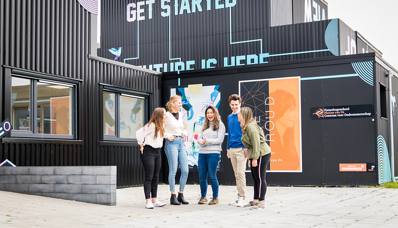 Five students standing in front of Centre of Expertise Entrepreneurship