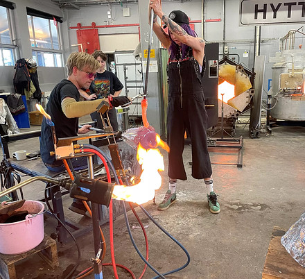 students working on metal