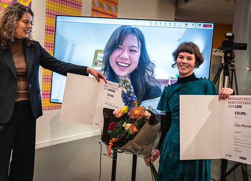 prijsuitreiking foto winnaars en wethouder